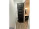 A half bathroom with a white sink, black cabinets, and neutral paint at 1333 Happy Hill Rd, Carrollton, GA 30116