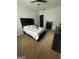 Spacious bedroom features a large bed, dark furniture, and carpet, offering a comfortable retreat at 1333 Happy Hill Rd, Carrollton, GA 30116