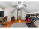 Well-lit bonus room features hardwood floors and a view to the hallway at 210 Farr Lake Dr, Tyrone, GA 30290