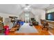 Spacious bonus room with hardwood floors and great natural light from large window at 210 Farr Lake Dr, Tyrone, GA 30290