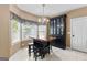 Bright kitchen dining area with breakfast bar, built-in cabinet and lots of light at 210 Farr Lake Dr, Tyrone, GA 30290