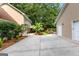 View of backyard, with the pool house, patio, and swimming pool at 210 Farr Lake Dr, Tyrone, GA 30290