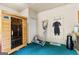 Features a sauna, elliptical machine and wetsuit, complemented by a door and minimalist decor at 210 Farr Lake Dr, Tyrone, GA 30290