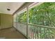 Outdoor patio with wooded backyard view offering privacy and shade at 210 Farr Lake Dr, Tyrone, GA 30290