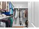 Well-organized walk-in closet with shelving and hanging space for optimal storage at 210 Farr Lake Dr, Tyrone, GA 30290