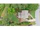 Aerial view of the property highlighting the layout, spacious yard, and surrounding greenery at 405 Woodbrook Way, Lawrenceville, GA 30043