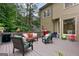 Spacious back deck with ample seating and a grill, offering a perfect spot for outdoor gatherings at 405 Woodbrook Way, Lawrenceville, GA 30043