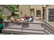 Cozy outdoor deck with comfortable seating, ideal for relaxing and enjoying the surrounding scenery at 405 Woodbrook Way, Lawrenceville, GA 30043