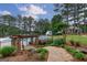 Community pool entrance and landscaping at 405 Woodbrook Way, Lawrenceville, GA 30043