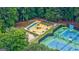 Aerial view of a community recreation area with tennis and pickleball courts and playground at 405 Woodbrook Way, Lawrenceville, GA 30043