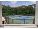 A view of the tennis courts at the club from a high vantage point at 405 Woodbrook Way, Lawrenceville, GA 30043
