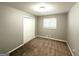 Bright bedroom with closet and natural light streaming through the window at 3948 Regent St, Douglasville, GA 30134