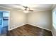 Comfortable bedroom featuring modern ceiling fan and wood-look flooring at 3948 Regent St, Douglasville, GA 30134