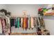 Spacious walk-in closet offers ample storage with shelves, hanging racks, and organizational features at 1243 Polk Xing, Mcdonough, GA 30252
