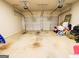 Spacious two-car garage with ample room for parking and storage at 1243 Polk Xing, Mcdonough, GA 30252