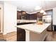 Spacious kitchen with an island, stainless steel appliances, and ample cabinet storage at 1243 Polk Xing, Mcdonough, GA 30252