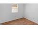 Bedroom with laminate flooring and bright natural light at 150 Glynn Addy Dr, Stockbridge, GA 30281