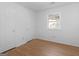 Cozy bedroom with neutral walls and laminate flooring at 150 Glynn Addy Dr, Stockbridge, GA 30281
