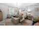 Charming bedroom featuring a decorative brick wall, chandelier, and comfortable furnishings at 340 Indian Lake Trl, Villa Rica, GA 30180
