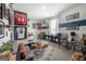 Inviting bonus room with a cozy seating area and sports decor, great for relaxation and hobbies at 340 Indian Lake Trl, Villa Rica, GA 30180