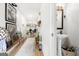 Inviting hallway leads to the living area, showcasing tasteful decor and a convenient half bathroom at 340 Indian Lake Trl, Villa Rica, GA 30180