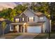 Beautiful two-story home with a brick and siding exterior and attached two car garage at 5229 Tye, Fairburn, GA 30213