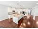 Spacious kitchen features granite countertops, stainless steel appliances, and a large center island at 5229 Tye, Fairburn, GA 30213