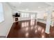 Bright and spacious living room with hardwood flooring, fireplace, and open floor plan at 5229 Tye, Fairburn, GA 30213