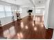 Bright and spacious living room with hardwood flooring, fireplace and open floor plan at 5229 Tye, Fairburn, GA 30213