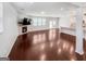 Bright and spacious living room with hardwood flooring, fireplace, and open floor plan at 5229 Tye, Fairburn, GA 30213
