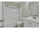 Bathroom with a tub and shower combination and a single sink vanity at 288 Winthrop Dr, Sharpsburg, GA 30277