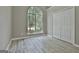 Bedroom with a large window with natural light and a double closet at 288 Winthrop Dr, Sharpsburg, GA 30277
