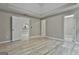 Open-concept living room with great natural light at 288 Winthrop Dr, Sharpsburg, GA 30277