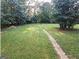 Large, grassy backyard perfect for to play at 3140 Kipling Dr, Powder Springs, GA 30127