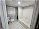 Accessible bathroom with handrails and walk-in bathtub at 3140 Kipling Dr, Powder Springs, GA 30127