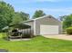 Spacious detached garage with boat shelter, offering ample storage and parking at 552 New Hope Rd, Mcdonough, GA 30252