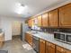Functional kitchen with wood cabinets, stainless steel appliances, and durable countertops for meal preparation at 552 New Hope Rd, Mcdonough, GA 30252