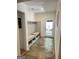 Convenient mudroom with built-in bench, storage, and stylish tile flooring leading to the exterior at 2062 Valiant Ne Dr, Atlanta, GA 30345