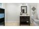 This bathroom features a stylish vanity and toilet, offering a clean and functional space at 312 Iron Horse Way, Stockbridge, GA 30281