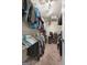 Spacious walk-in closet with ample hanging and shelving space for organized storage at 312 Iron Horse Way, Stockbridge, GA 30281