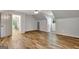 Spacious bedroom with wood floors, neutral walls, and plenty of natural light from the window at 1572 Hines Rd, Moreland, GA 30259