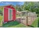 Well-maintained chicken coop and enclosed run, perfect for hobby farmers or animal enthusiasts on the property at 1572 Hines Rd, Moreland, GA 30259