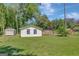 Multiple outbuildings in a large backyard, offering lots of space for hobbies, equipment and animals at 1572 Hines Rd, Moreland, GA 30259