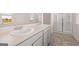 Bright bathroom with dual sinks, modern fixtures, and a glass-enclosed shower at 170 Aster Ave, Locust Grove, GA 30248