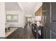 Welcoming entryway with hardwood floors and view into dining and living spaces at 170 Aster Ave, Locust Grove, GA 30248