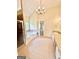 Well-lit bathroom with a shower, soaking tub, vanity with granite countertop, and tile flooring at 759 Hennepin Ter, Mcdonough, GA 30253