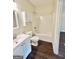 Bathroom featuring a vanity, toilet, bathtub and cabinet at 759 Hennepin Ter, Mcdonough, GA 30253
