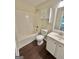 Bathroom features a vanity, toilet, bathtub with shower at 759 Hennepin Ter, Mcdonough, GA 30253