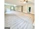 Expansive bonus room with neutral carpeting, a ceiling fan, recessed lighting, and windows at 759 Hennepin Ter, Mcdonough, GA 30253