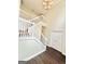 Spacious foyer featuring hardwood floors, a staircase, and double doors, offering a grand entrance at 759 Hennepin Ter, Mcdonough, GA 30253